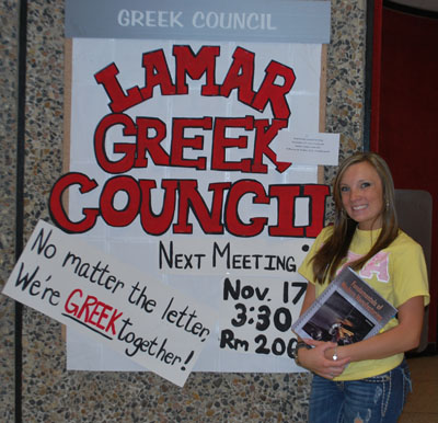 Candice Montgomery with Greek Council bulletin board
